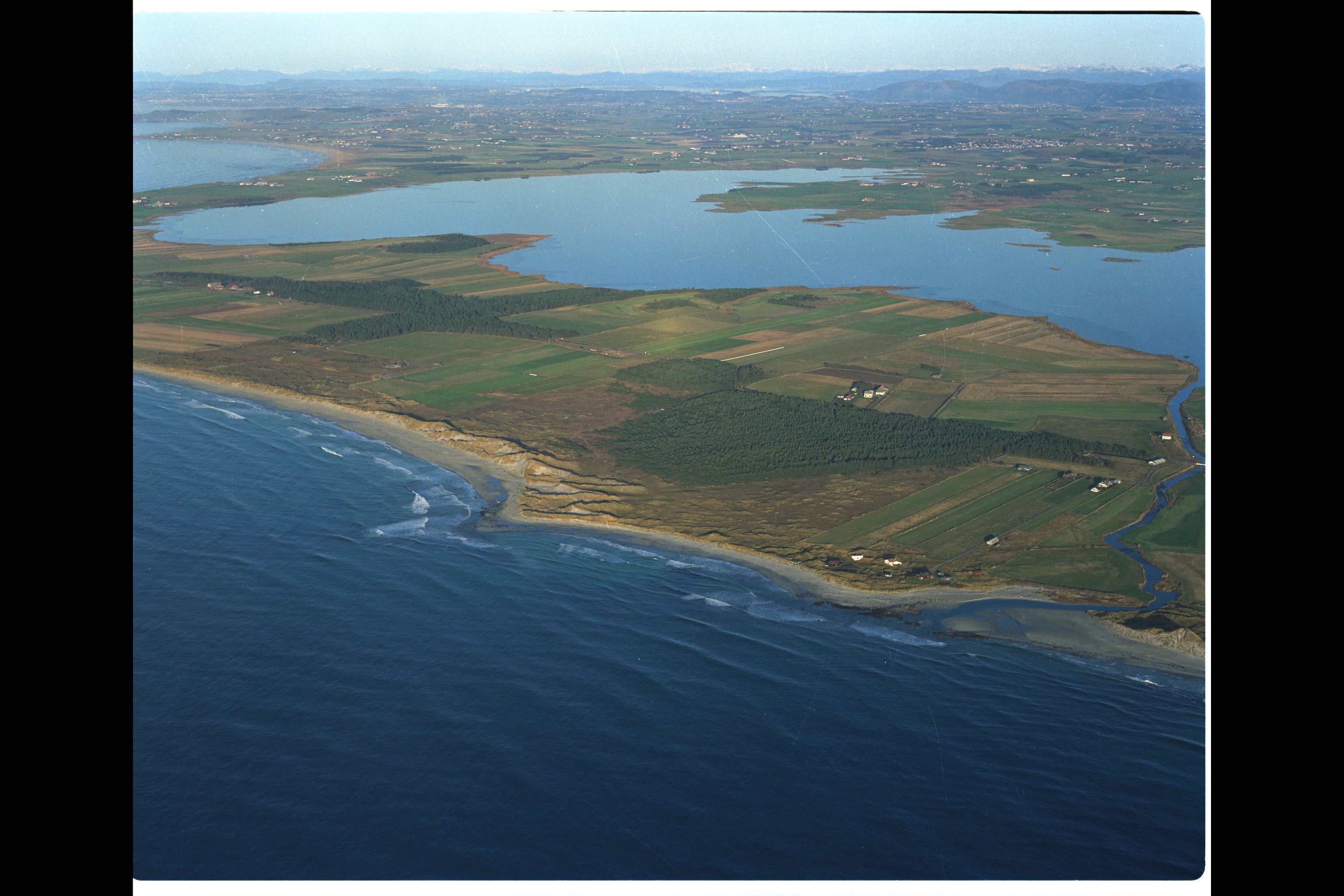 The sand beaches With lake Orrevatnet in the background